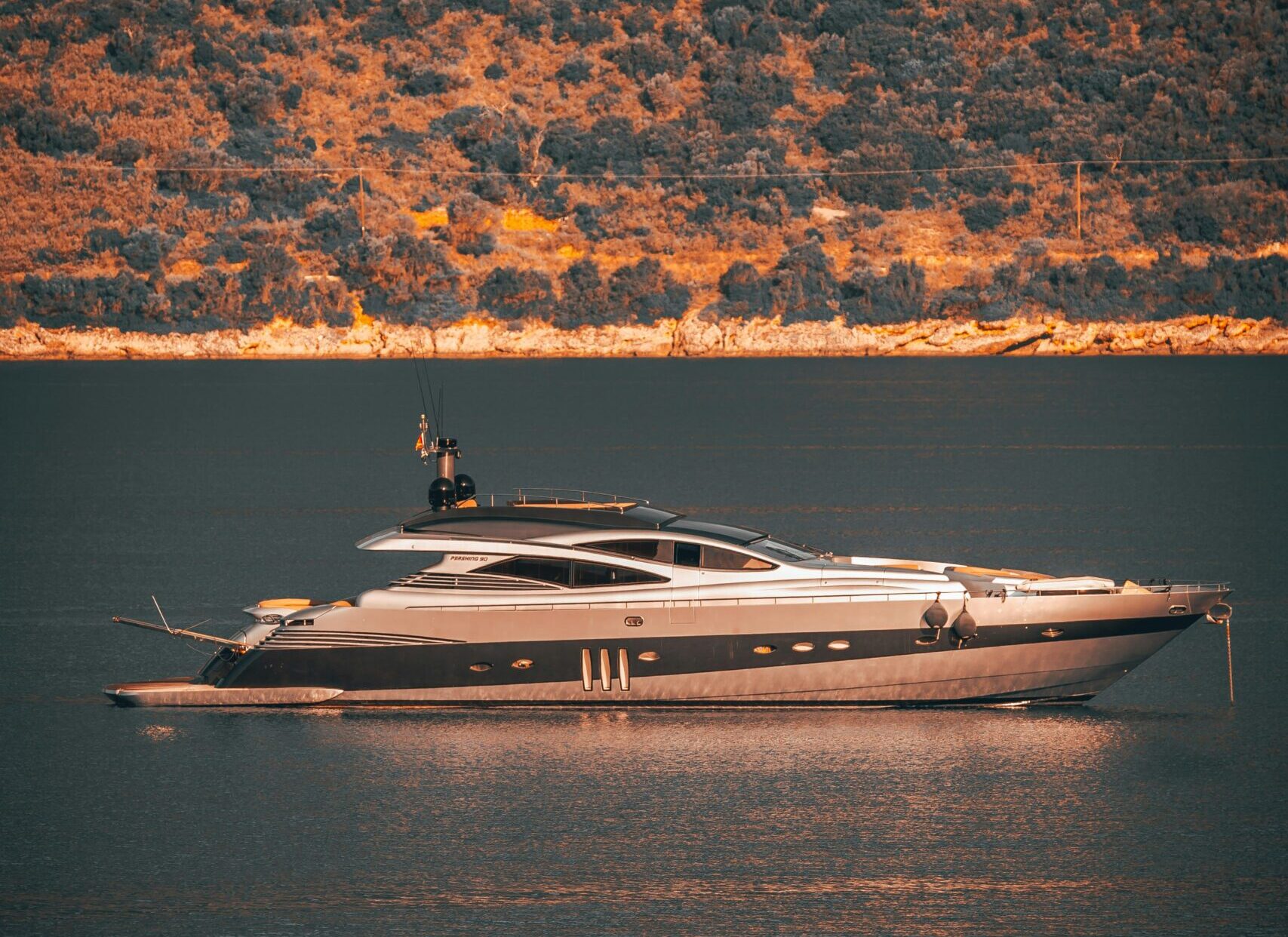 Luxury yacht sailing around Ibiza in autumn.